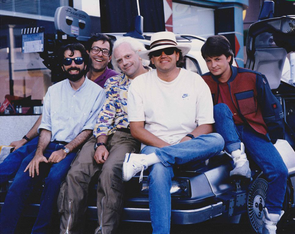 Robert Zemeckis, Bob Gale and Neil Canton with Michael J. Fox and Christopher Lloyd. Robert Zemeckis, Bob Gale and Neil Canton with Michael J. Fox and Christopher Lloyd.