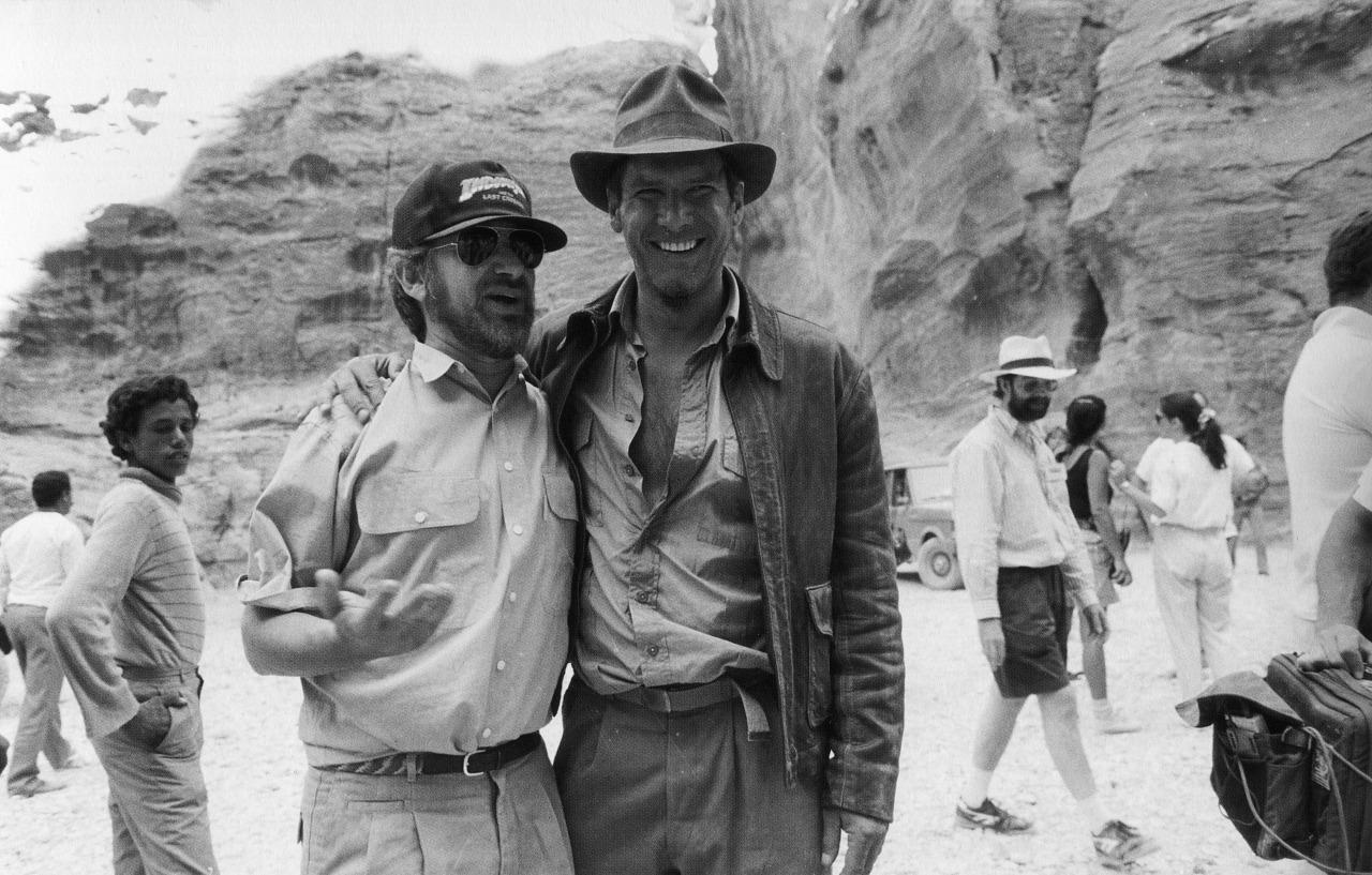 Harrison Ford with Steven Spielberg on the set of 'Indiana Jones and the Last Crusade' Harrison Ford with Steven Spielberg on the set of Indiana Jones and the Last Crusade.